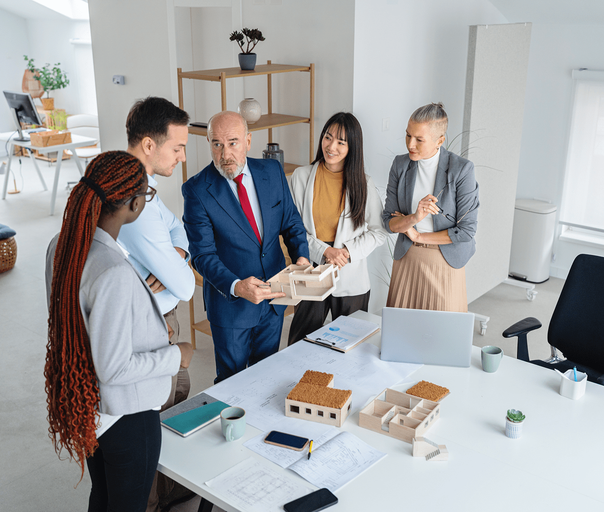 Team reviewing architectural plans